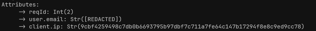 Sensitive values absent or redacted after applying the attributes processor